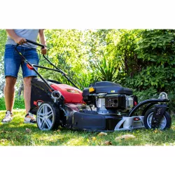 Tondeuse thermique - auto-tractée  196 cm³ 56 cm - démarrage manuel avec lanceur 